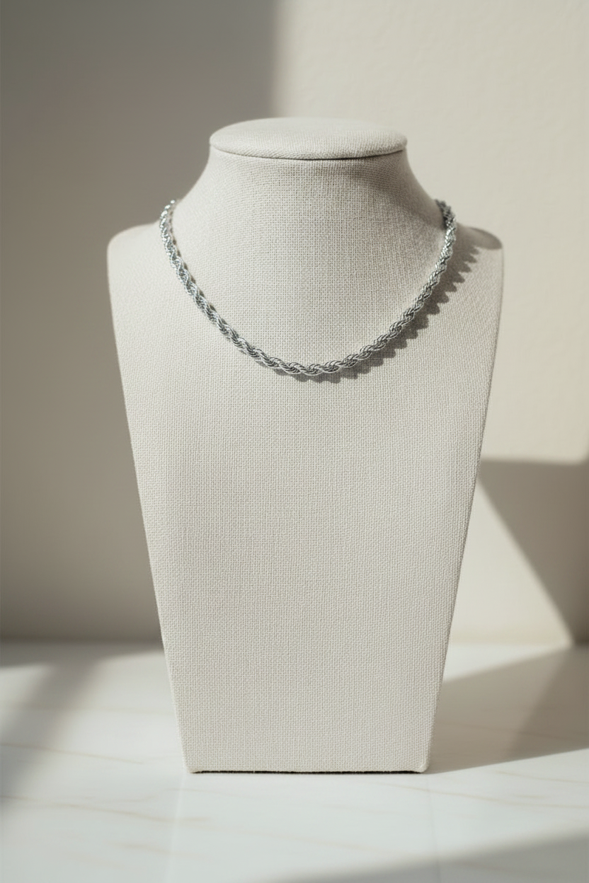 Silver rope chain with balanced cool-neutral background