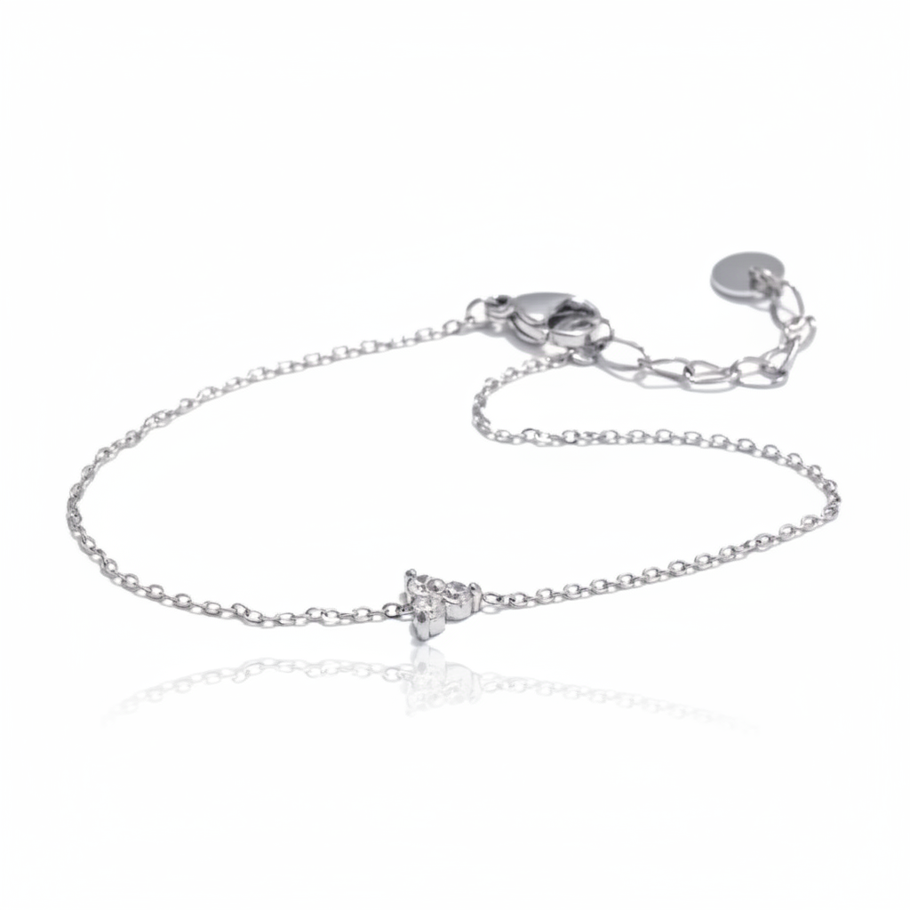 Dainty silver chain bracelet with a delicate crystal cluster charm on a white background, everyday minimalist silver jewelry by Lumire