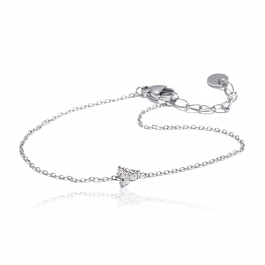 Dainty silver chain bracelet with a delicate crystal cluster charm on a white background, everyday minimalist silver jewelry by Lumire