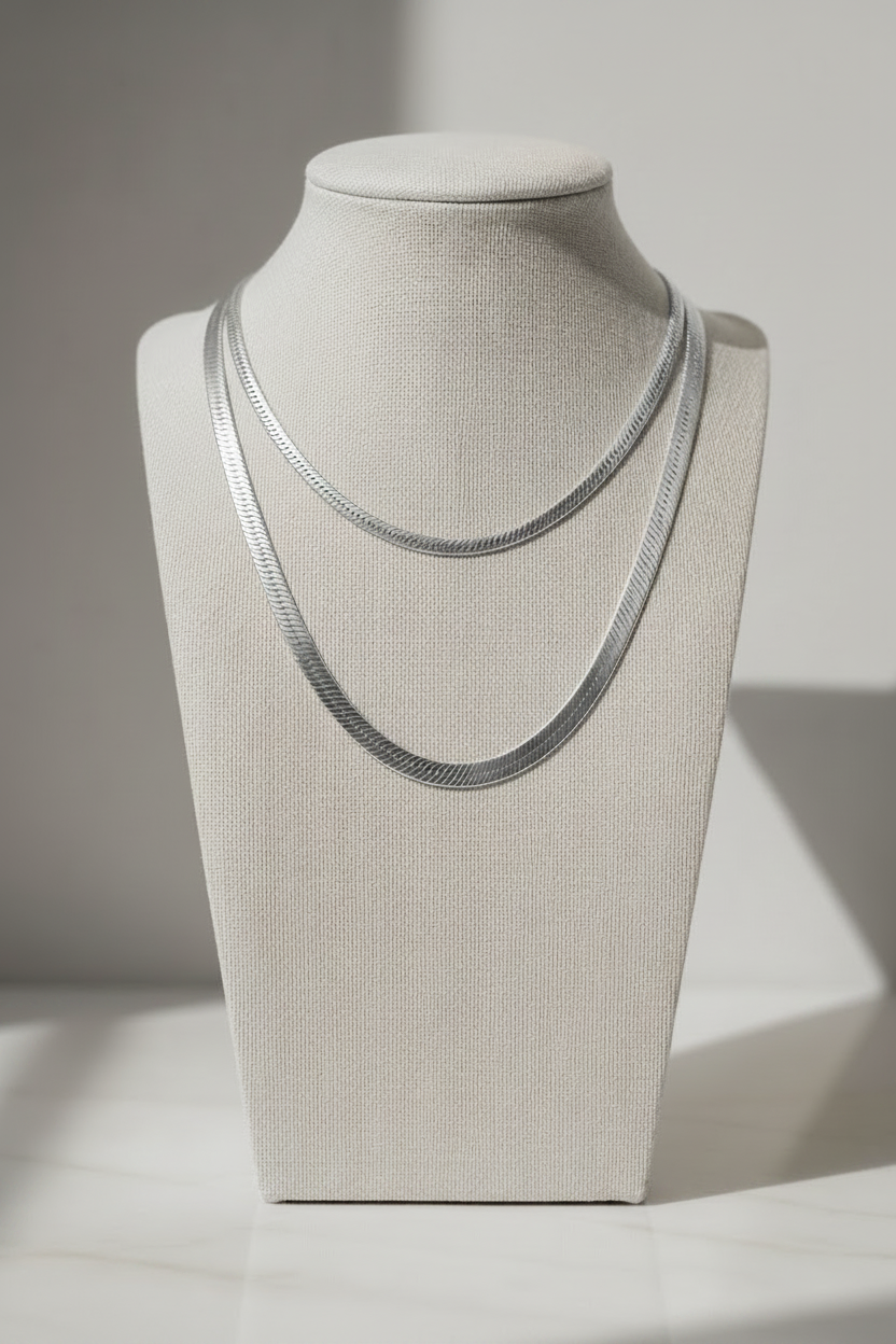 Silver Herringbone Necklaces — Cool Background