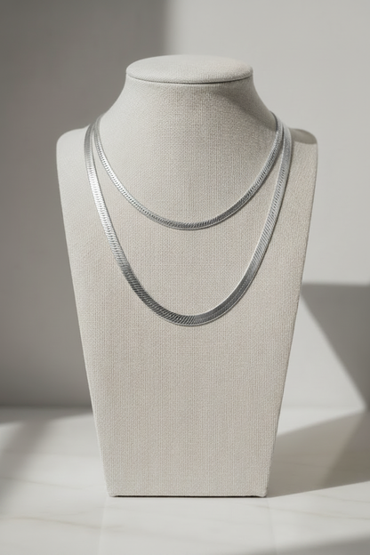Silver Herringbone Necklaces — Cool Background